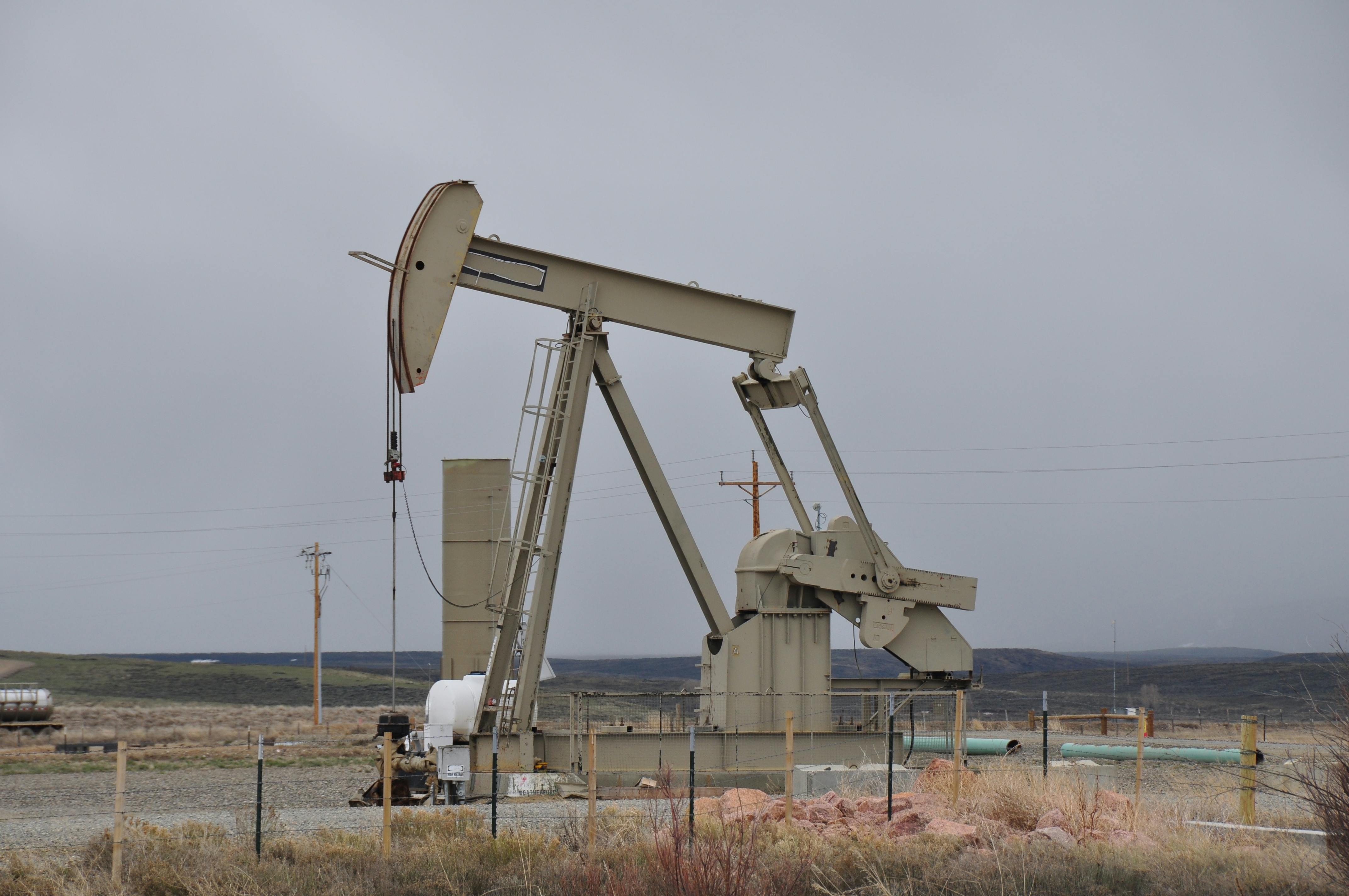 Oil pumpjack in an open landscape